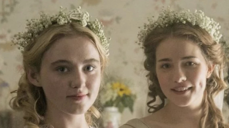 Kathryn Newton and Willa Fitzgerald smiling in Little Women