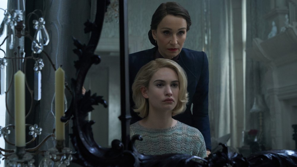 Lily James as Mrs. de Winter and Kristin Scott Thomas as Mrs. Danvers in Rebecca