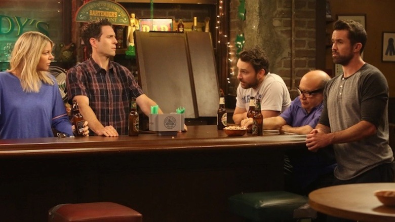 The gang sits at the bar