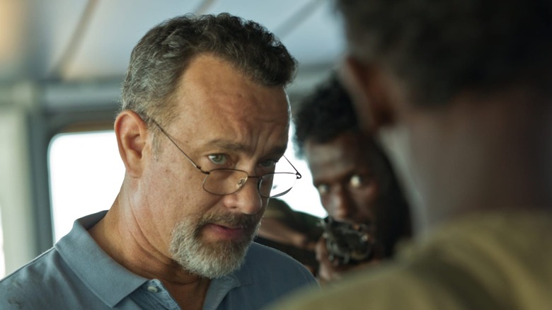 Captain Phillips looking at pirate