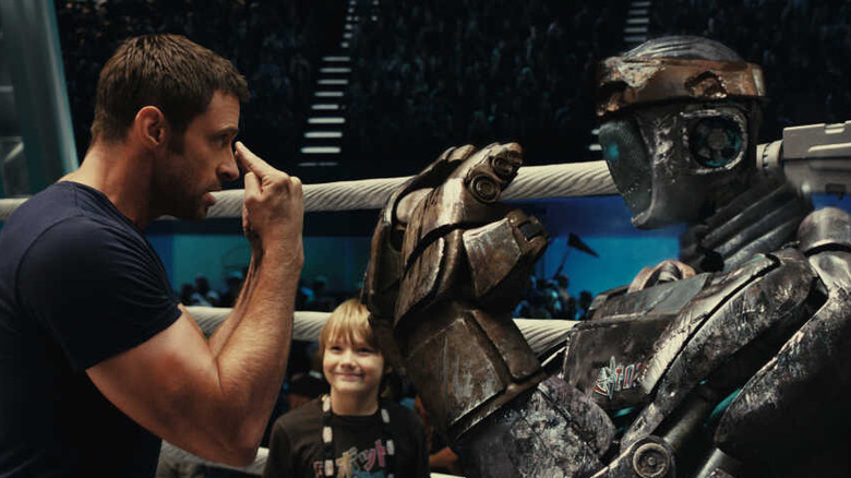 atom shadowing hugh jackman in real steel