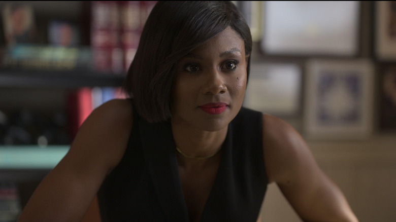 Emayatzy Corinealdi as Jax smirking