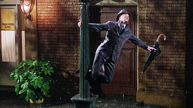 Gene Kelly swinging around a light pole in Singin' in the Rain