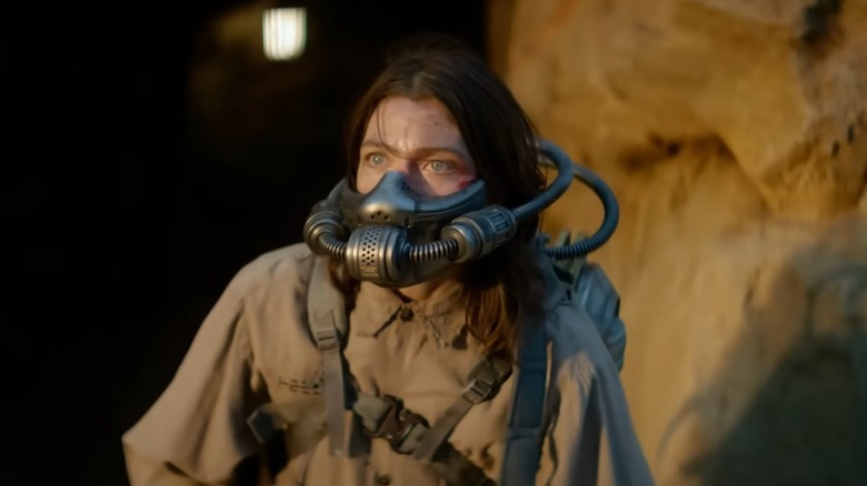 Woman wearing breathing apparatus