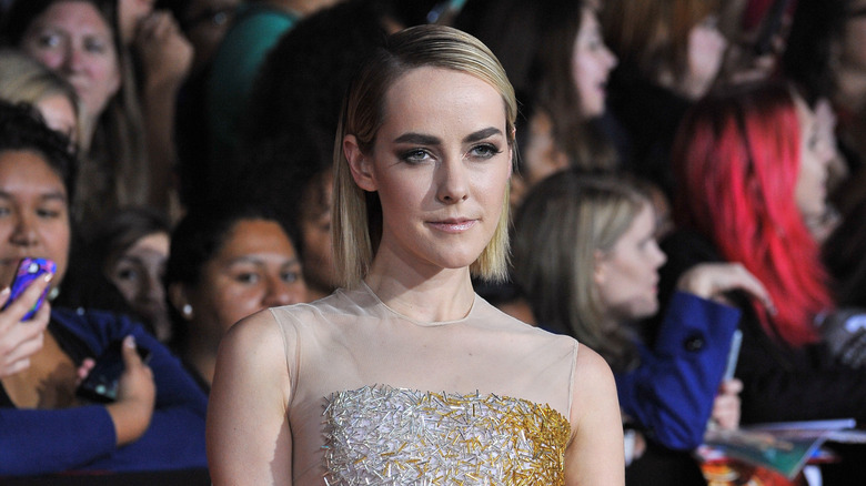 Jena Malone smirks