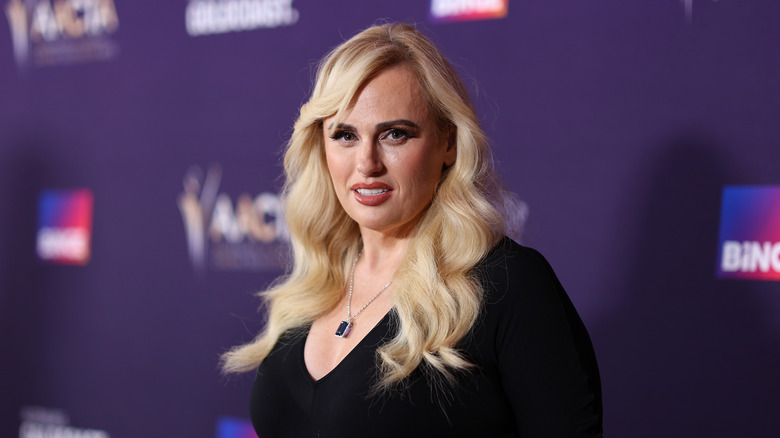 Rebel Wilson in black top