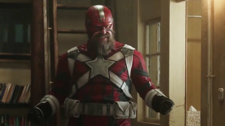 Red Guardian poses in his suit.