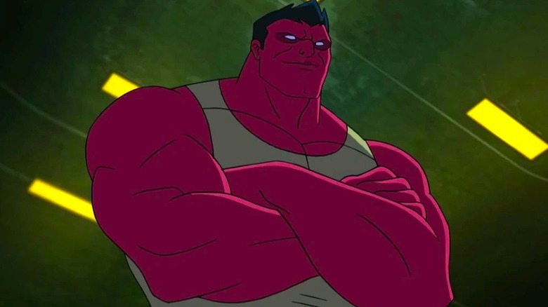 Red Hulk crosses his arms