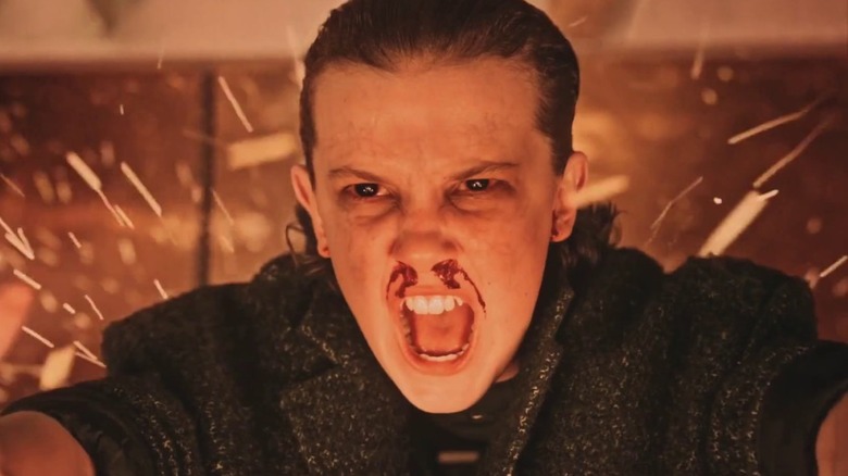 Eleven uses her powers to close the gateway