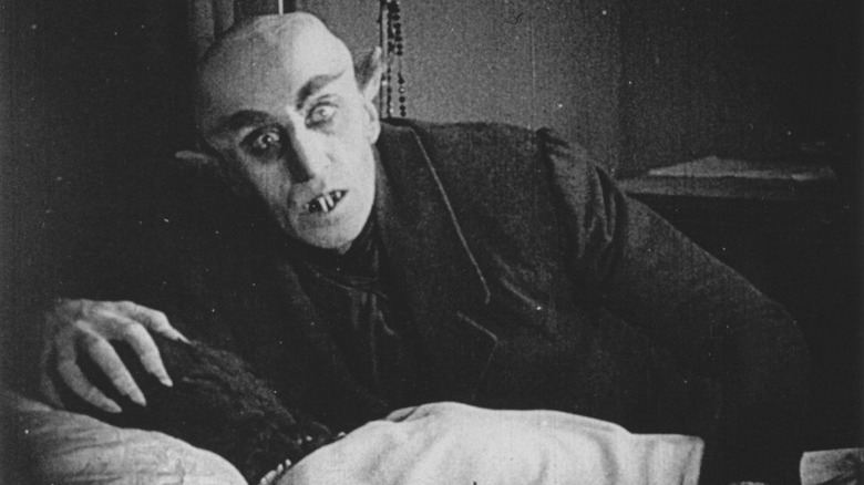 Count Orlok from Nosferatu feeding