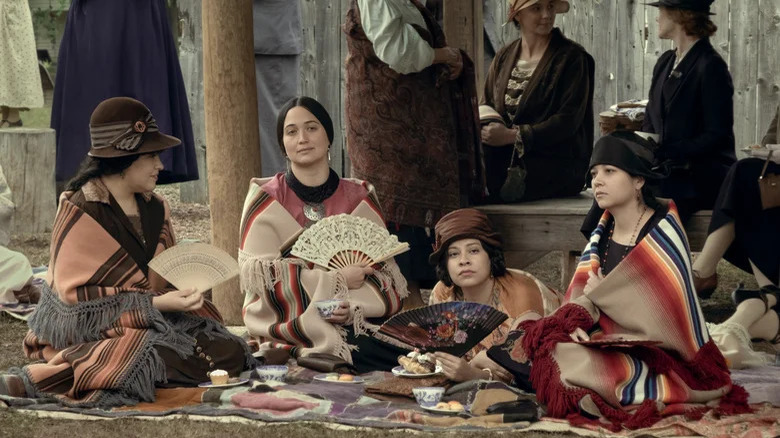 Osage women sitting on the ground