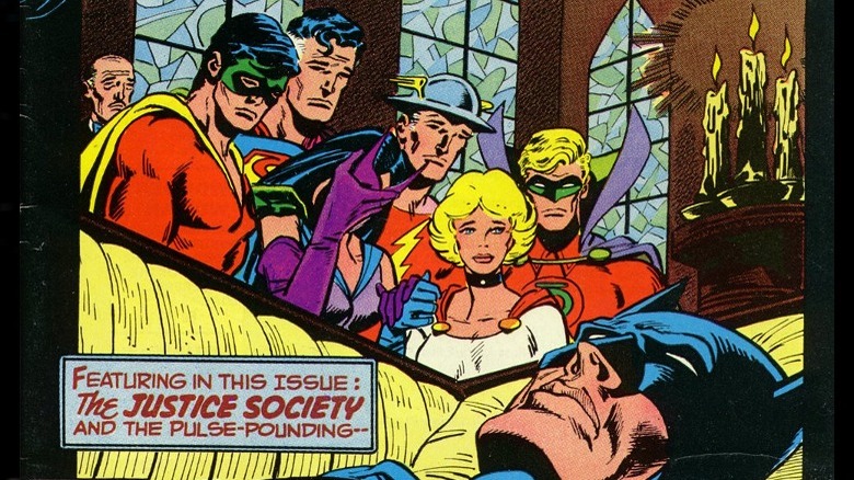 Batman in coffin as superheroes grieve