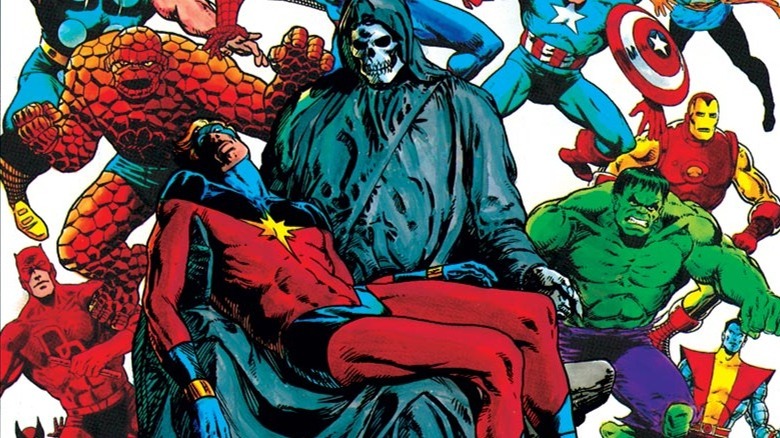 Death holding Captain Marvel's body