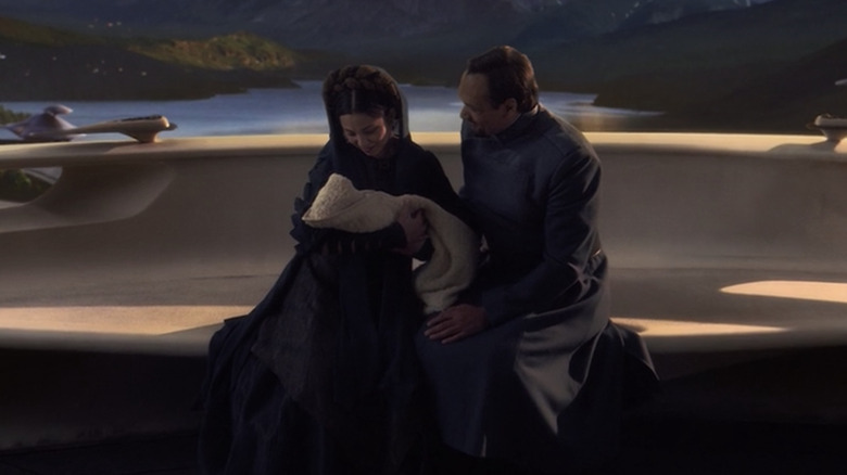 Queen Breha and Senator Bail Organa hold Leia