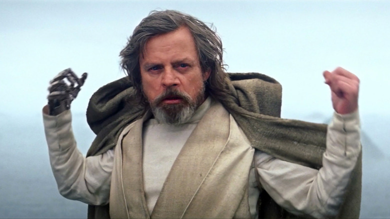 Luke Skywalker throws off his robe