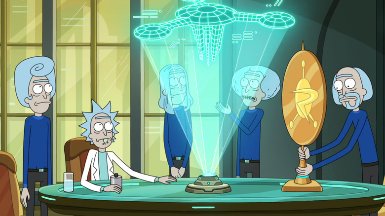 Versions of Rick look at schematics for the Cidatel of Ricks on Rick and Morty