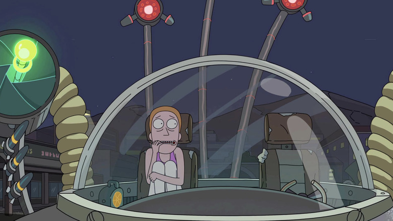 Summer Smith sitting scared in a space ship, biting her nails