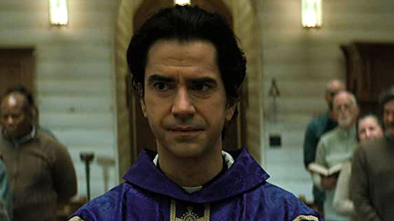 Hamish Linklater wearing robes in Midnight Mass