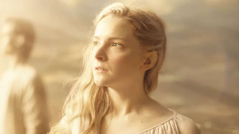 A close up of Galadriel with light on her face