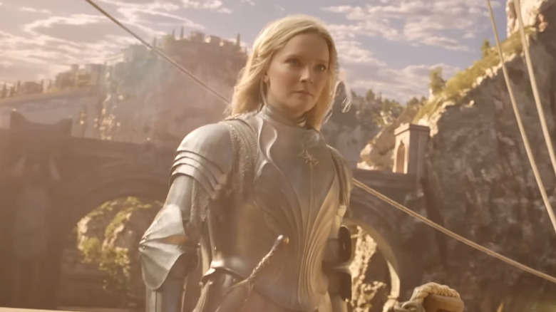 Galadriel in armor boards a ship