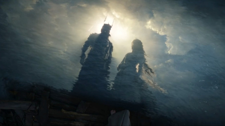 Sauron and Galadriel view their altered reflections