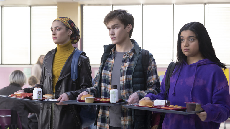 Kamala, Bruno, and Nakia with lunch trays