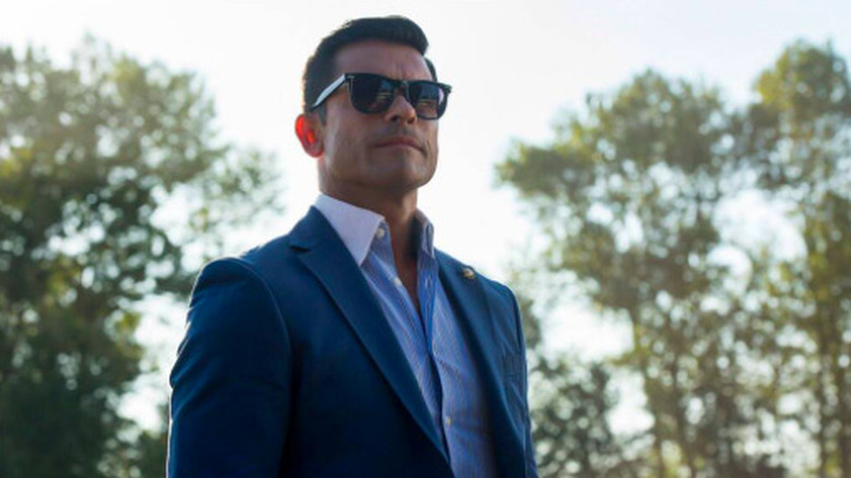 Hiram Lodge wearing sunglasses