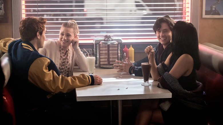 Archie, Jughead, Betty, and Veronica in Pop's Diner