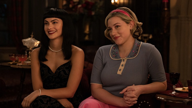 Betty and Veronica sitting next to each other