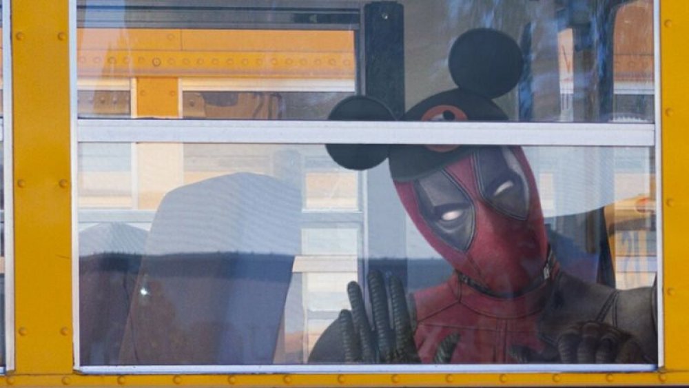 Deadpool boards the Disney bus