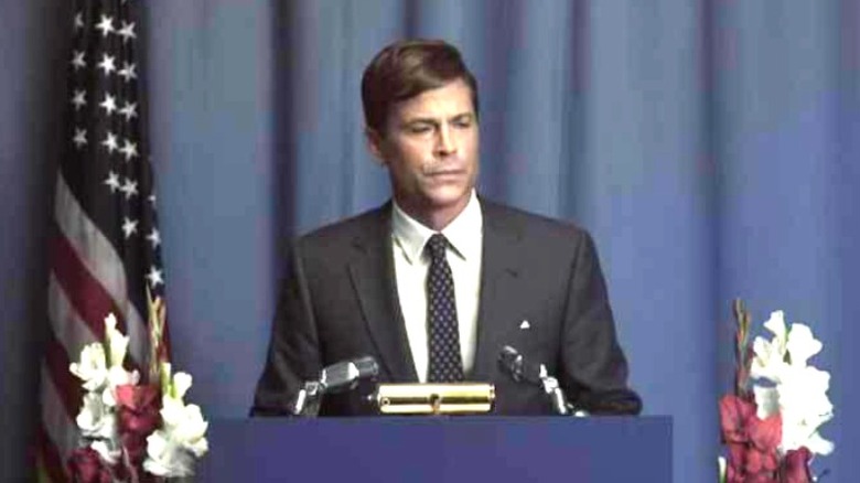 Rob Lowe at podium in Killing Kennedy