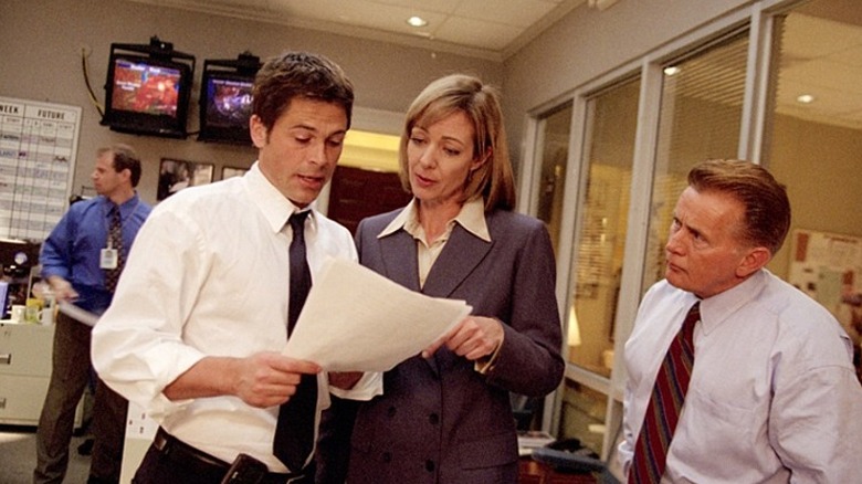 Rob Lowe and Allison Janney read papers in The West Wing