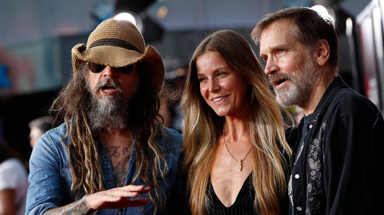 Rob Zombie, Sheri Moon Zombie, and Bill Moseley posing