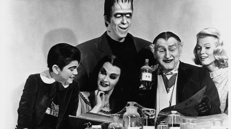 The Munster family gathered together