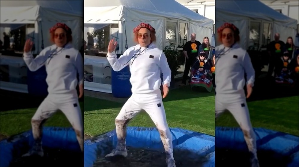 Robert Downey Jr. dancing outside