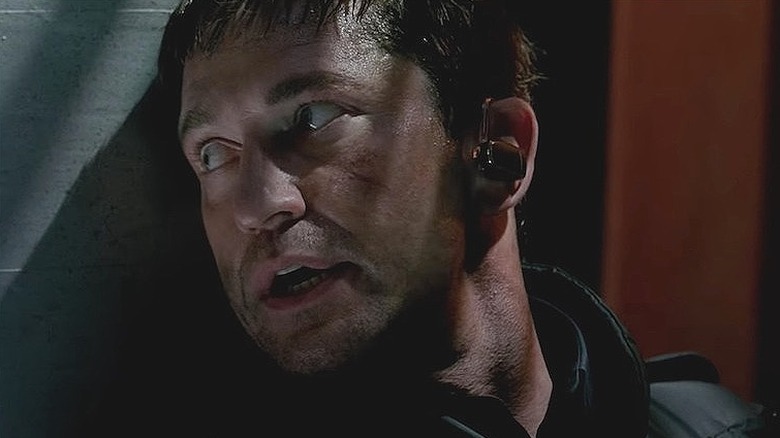 Gerard Butler wearing earpiece