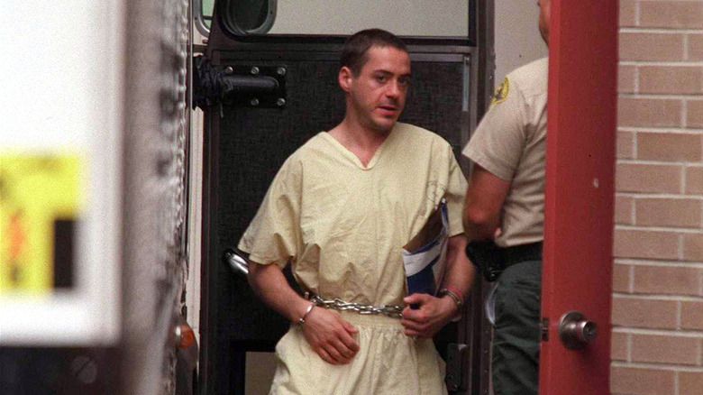 Robert Downey Jr. in handcuffs