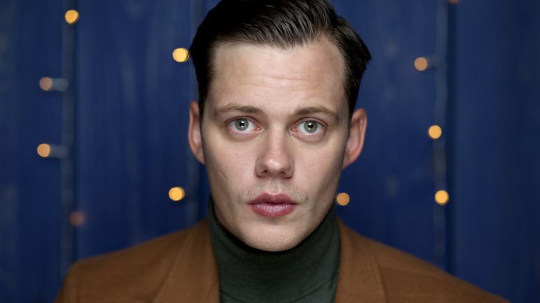 Bill Skarsgard posing