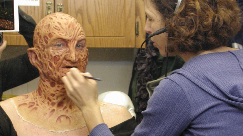 Robert Englund getting Freddy Krueger makeup done