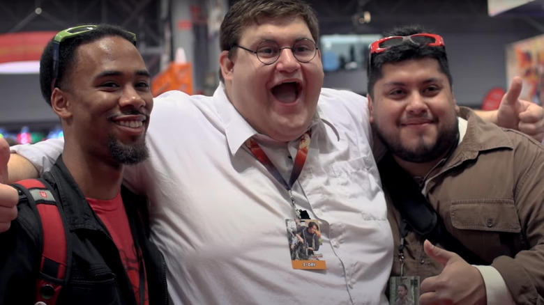 Peter Griffin taking picture with fans