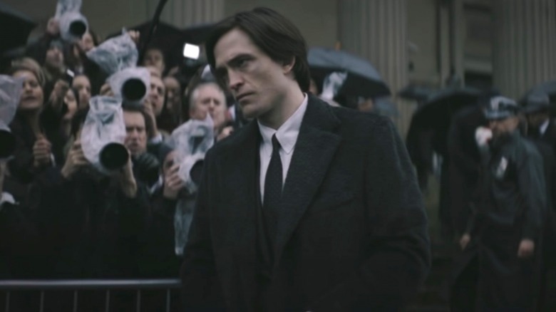 Robert Pattinson looking worn out in The Batman