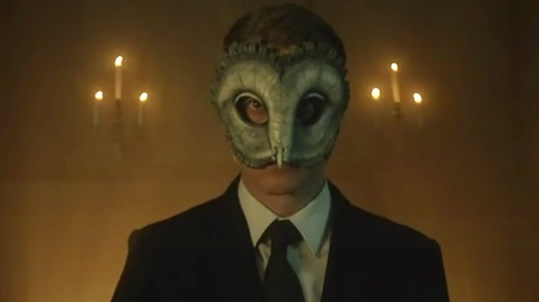 Jim Gordon wearing owl mask