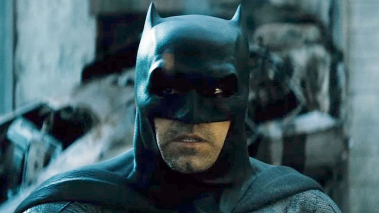 Ben Affleck as Batman in wreckage