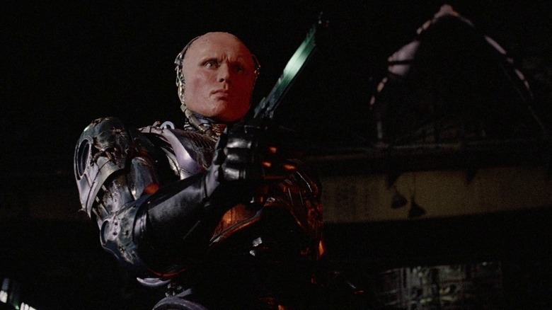 RoboCop holds gun