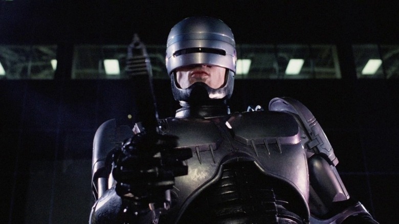 RoboCop holds gun