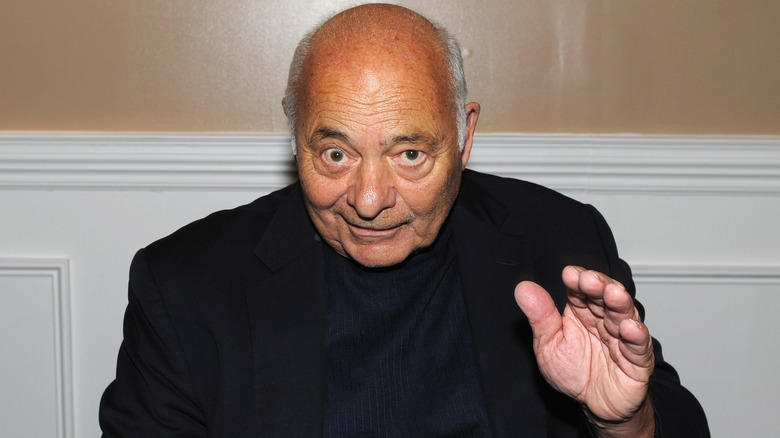 Burt Young raising hand