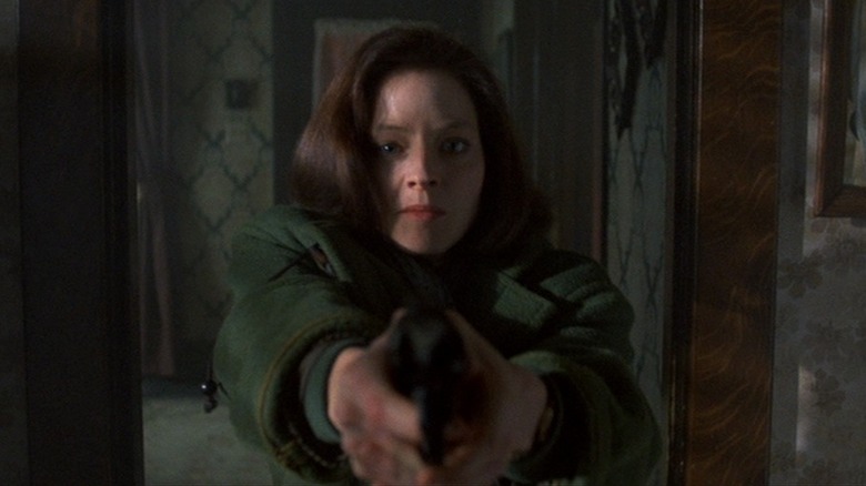 Clarice pointing gun