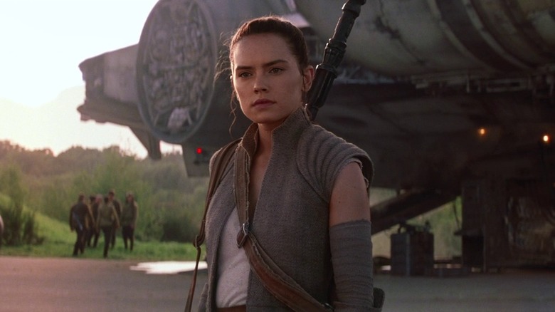 Rey standing by ship