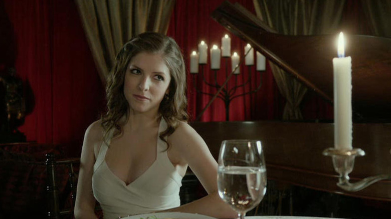 Anna Kendrick wears a white dress