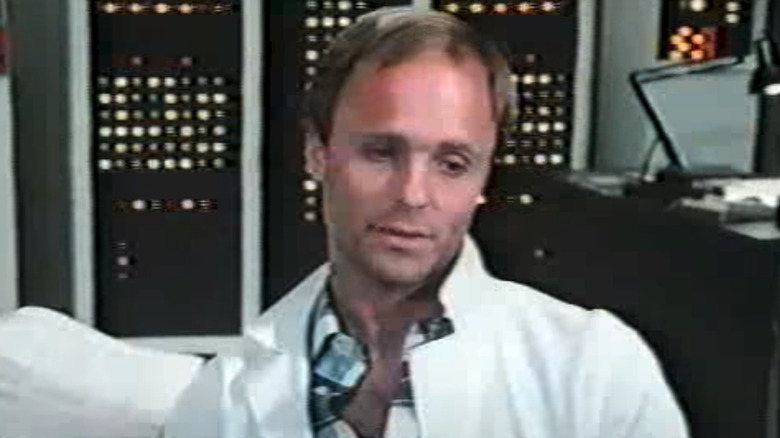 Ed Harris in a laboratory